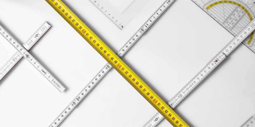 measuring tape on a blueprint