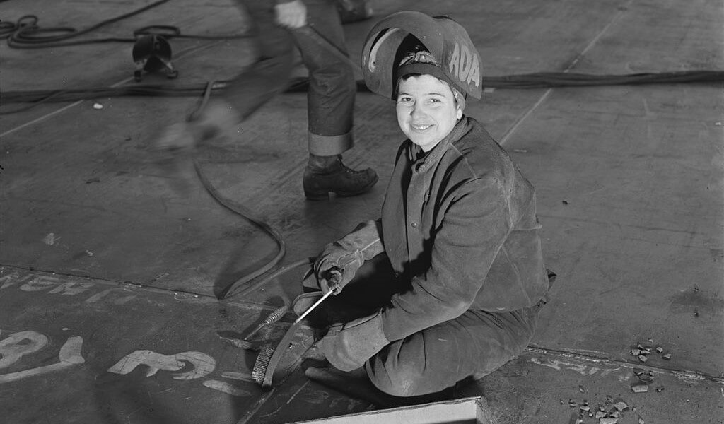 woman welding in a shipyard